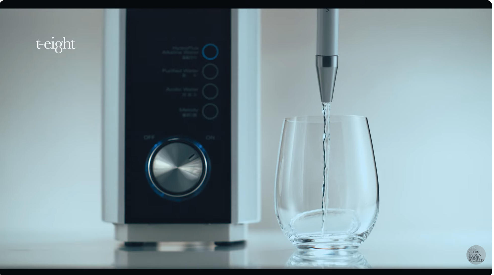 Clear liquid poured into a glass during a studio product shoot